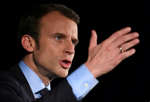 France's Macron unveils priorities as race tightens