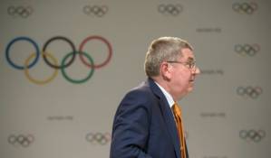 Olympic chief defends handling of corruption case.jpg
