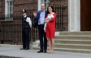 Britain's Prince William and Kate return home with newborn son.jpg