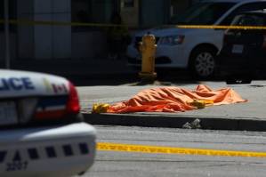 Van plows into Toronto crowd in 'deliberate' act, leaving 10 dead.jpg