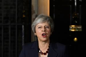 UK's May takes Brexit deal to rebellious MPs.jpg