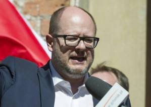 Polish mayor 'critical' after being stabbed in heart at fundraiser.jpg