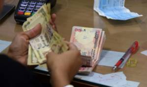 A year after cash ban, India's black money market is thriving.jpg