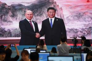 As G7 feuds, Xi and Putin play up their own club.jpg