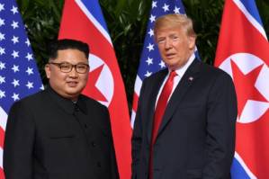 Trump, Kim hail historic summit; questions over way forward.jpg