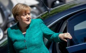 Merkel under pressure in escalating row over immigration.jpg