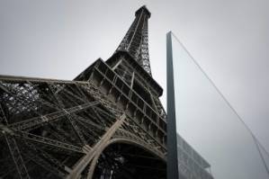Paris puts final touches to Eiffel Tower anti-terror walls.jpg