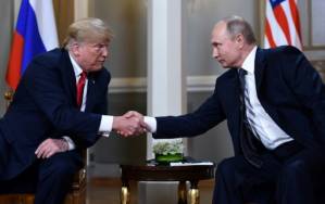 At summit, Trump refuses to confront Putin on vote row.jpg