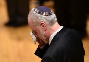 Mourners pack emotional vigil for victims of US synagogue attack.jpg