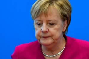 Weakened Merkel to step down as chancellor in 2021.jpg