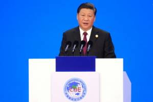 Xi pledges to open China's markets wider to an impatient world.jpg