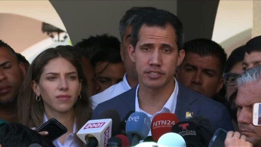 Venezuela's Guaido warns military on blocked aid