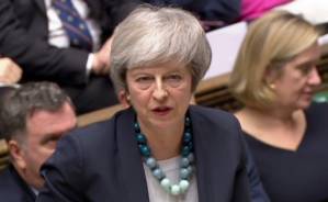 May heads to Europe in bid to save Brexit deal under fire.jpg