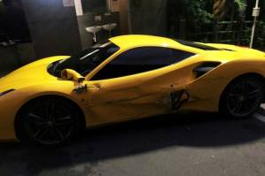 Donations flood in for Taiwan driver who smashed into three Ferraris.jpg