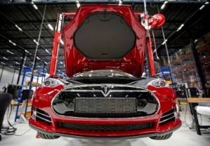 Tesla to cut 7% of workforce amid tough profit outlook.jpg