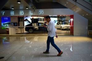 Tesla probes car fire in Shanghai.jpg