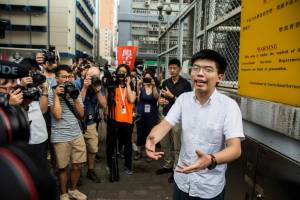 Hong Kong activist Joshua Wong leaves jail, vows to join protests.jpg