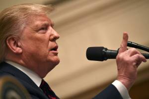 Trump defends Syria pullout, condemned by House in bipartisan vote.jpg