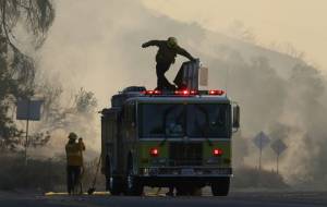 Tens of thousands evacuated as wildfires rage in California.jpg