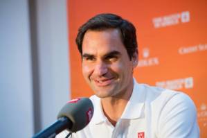 Players back Federer over tennis merger as Kyrgios hits out.jpg