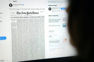 NYTimes marks grim US virus milestone with front page victim list.jpg