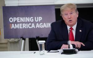 Trump cuts ties with WHO as pandemic grips Latin America.jpg