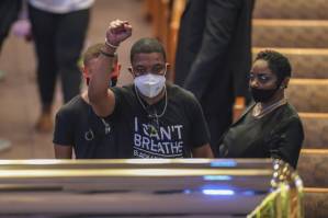 Thousands mourn George Floyd as accused officer appears in court.jpg