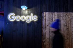 Under pressure, Google to pay some outlets for news content.jpg