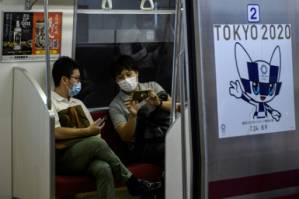 Olympic cancellation spectre haunts Tokyo, one year before postponed Games.jpg