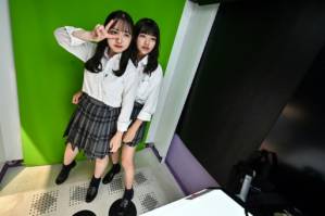 Japan's purikura photo booths cling on.jpg