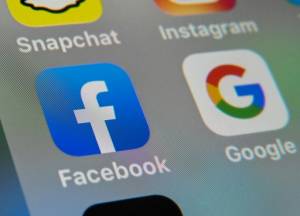 Australia unveils law forcing tech giants to pay for news.jpg
