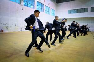 China's rich seek bodyguards schooled in digital dark arts.jpg