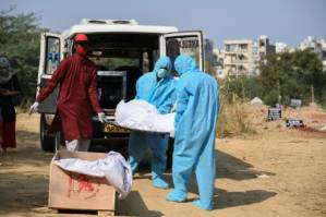 India's coronavirus cases pass nine million as Delhi struggles.jpg