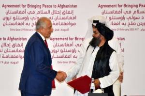 Afghan peace talks resume as bloodshed continues.jpg