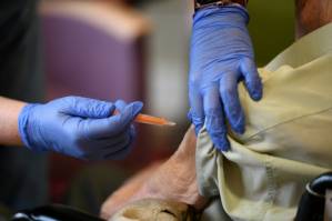 reports on Covid-19 jab efficacy in elderly.jpg