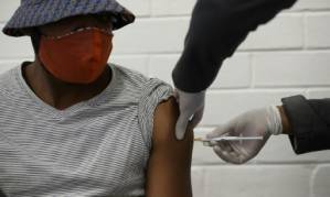 Apartheid ghosts stalk S.Africa's vaccine fears.jpg