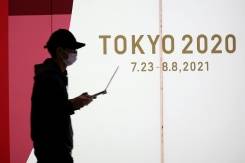 Tokyo tightening virus measures nearly 100 days before Olympics.jpg