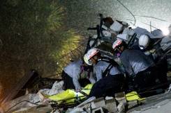 Crews comb rubble of collapsed Florida condo, 99 unaccounted for.jpg