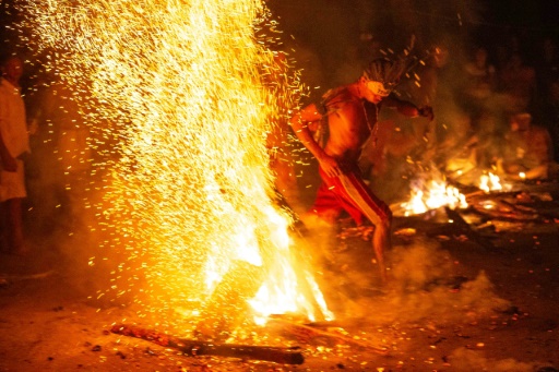 Fire, tobacco and spirits: Venezuelans fight Covid with ritual