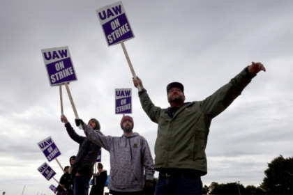 Frustrated and weary over long pandemic hours, more US workers are striking.jpg