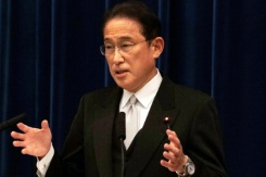 Japan unveils record $490 bn stimulus to boost pandemic recovery.jpg Japan unveils record $490 bn stimulus to boost pandemic recovery.jpg