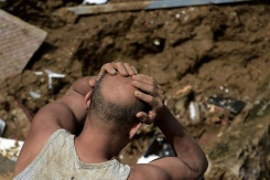 Rescuers scour for survivors after Brazil floods, landslides kill 94.jpg Rescuers scour for survivors after Brazil floods, landslides kill 94.jpg