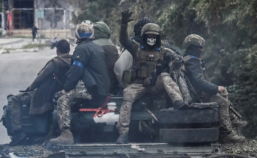 Ukraine's Zelensky vows 'victory' on visit to liberated Kharkiv region