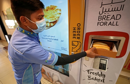 In wealthy Dubai, poor get free bread from machines