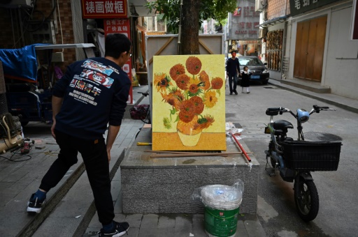 China's 'art factory' painters turn from fakes to originals