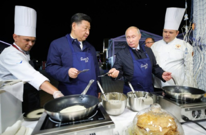 Xi, Putin hail ties ahead of 'journey of peace' to Moscow.jpg