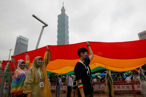 Taiwan expands adoption rights for same-sex couples