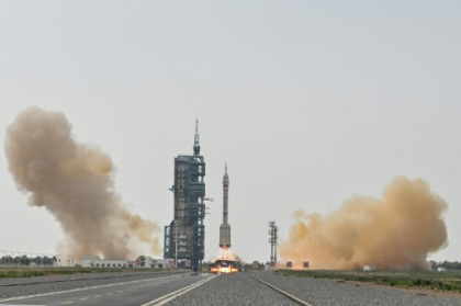 China launches mission with first civilian to space station.jpg