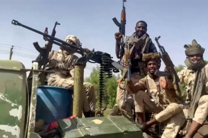 UN warns Sudan faces 'full-scale civil war' as air raid kills 22.jpg
