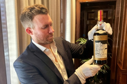 Record for world's priciest bottle of whisky smashed at London auction.jpg Record for world's priciest bottle of whisky smashed at London auction.jpg